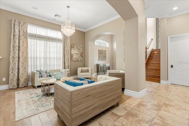 Welcome to 360 Muirfield Loop, an immaculate home that offers on ChampionsGate Golf Resort in Florida - for sale on GolfHomes.com, golf home, golf lot