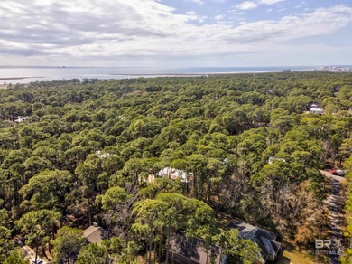 Are you looking for a Gold Fortified home nestled away in *The on Isle Dauphine Club Golf Course in Alabama - for sale on GolfHomes.com, golf home, golf lot