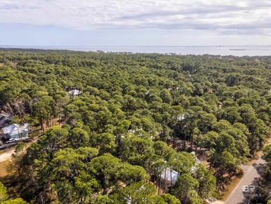 Are you looking for a Gold Fortified home nestled away in *The on Isle Dauphine Club Golf Course in Alabama - for sale on GolfHomes.com, golf home, golf lot