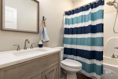 Are you looking for a Gold Fortified home nestled away in *The on Isle Dauphine Club Golf Course in Alabama - for sale on GolfHomes.com, golf home, golf lot