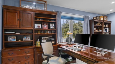 Elevate your vision of paradise in this stunning, 4BR/4BA on Peninsula Golf and Racquet Club in Alabama - for sale on GolfHomes.com, golf home, golf lot