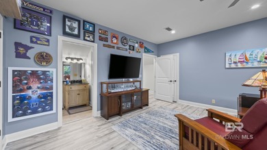 Elevate your vision of paradise in this stunning, 4BR/4BA on Peninsula Golf and Racquet Club in Alabama - for sale on GolfHomes.com, golf home, golf lot