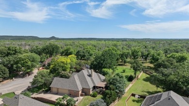 PRICE REDUCED!!  Gorgeous brick & stone home with a special on Pecan Plantation Country Club in Texas - for sale on GolfHomes.com, golf home, golf lot