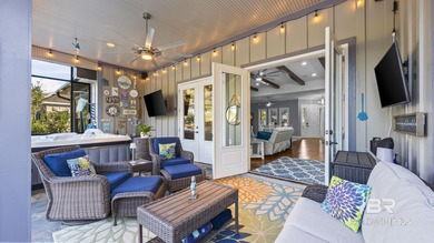 Elevate your vision of paradise in this stunning, 4BR/4BA on Peninsula Golf and Racquet Club in Alabama - for sale on GolfHomes.com, golf home, golf lot