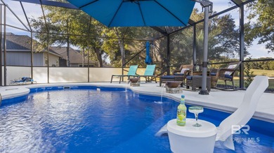 Elevate your vision of paradise in this stunning, 4BR/4BA on Peninsula Golf and Racquet Club in Alabama - for sale on GolfHomes.com, golf home, golf lot