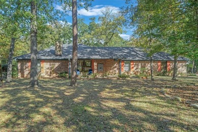 Fantastic curb appeal on this 3BD-2BA brick home in Holly Lake on Holly Lake Ranch Golf Club in Texas - for sale on GolfHomes.com, golf home, golf lot