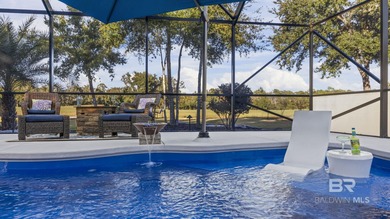 Elevate your vision of paradise in this stunning, 4BR/4BA on Peninsula Golf and Racquet Club in Alabama - for sale on GolfHomes.com, golf home, golf lot