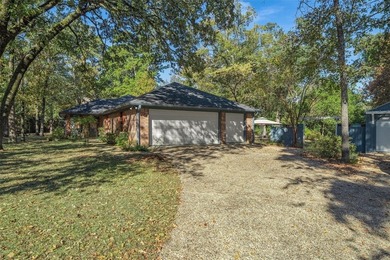 Fantastic curb appeal on this 3BD-2BA brick home in Holly Lake on Holly Lake Ranch Golf Club in Texas - for sale on GolfHomes.com, golf home, golf lot