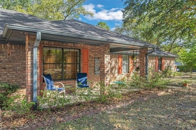 Fantastic curb appeal on this 3BD-2BA brick home in Holly Lake on Holly Lake Ranch Golf Club in Texas - for sale on GolfHomes.com, golf home, golf lot
