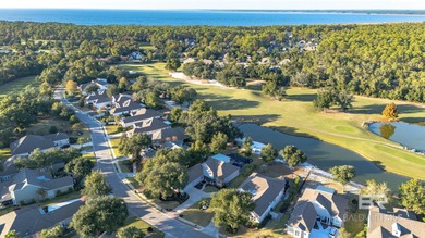 Elevate your vision of paradise in this stunning, 4BR/4BA on Peninsula Golf and Racquet Club in Alabama - for sale on GolfHomes.com, golf home, golf lot