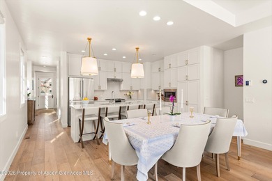 This sophisticated townhome in The Fairway's neighborhood of on River Valley Ranch Golf Club in Colorado - for sale on GolfHomes.com, golf home, golf lot