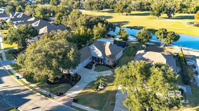 Elevate your vision of paradise in this stunning, 4BR/4BA on Peninsula Golf and Racquet Club in Alabama - for sale on GolfHomes.com, golf home, golf lot