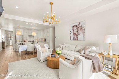 This sophisticated townhome in The Fairway's neighborhood of on River Valley Ranch Golf Club in Colorado - for sale on GolfHomes.com, golf home, golf lot