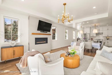 This sophisticated townhome in The Fairway's neighborhood of on River Valley Ranch Golf Club in Colorado - for sale on GolfHomes.com, golf home, golf lot