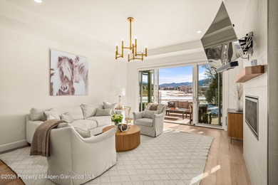This sophisticated townhome in The Fairway's neighborhood of on River Valley Ranch Golf Club in Colorado - for sale on GolfHomes.com, golf home, golf lot