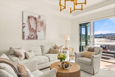 This sophisticated townhome in The Fairway's neighborhood of on River Valley Ranch Golf Club in Colorado - for sale on GolfHomes.com, golf home, golf lot