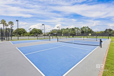 Elevate your vision of paradise in this stunning, 4BR/4BA on Peninsula Golf and Racquet Club in Alabama - for sale on GolfHomes.com, golf home, golf lot