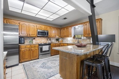 This home delivers immediate curb appeal with a generous front on Hide-A-Way Lake Golf Course in Texas - for sale on GolfHomes.com, golf home, golf lot