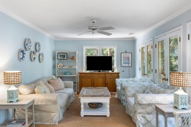 Classic and elegantly designed home with French provincial style on The Seabrook Island Club in South Carolina - for sale on GolfHomes.com, golf home, golf lot