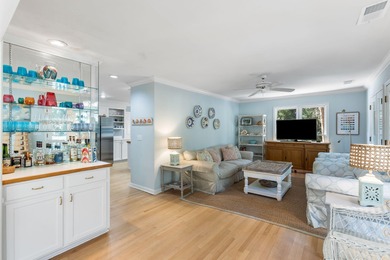 Classic and elegantly designed home with French provincial style on The Seabrook Island Club in South Carolina - for sale on GolfHomes.com, golf home, golf lot