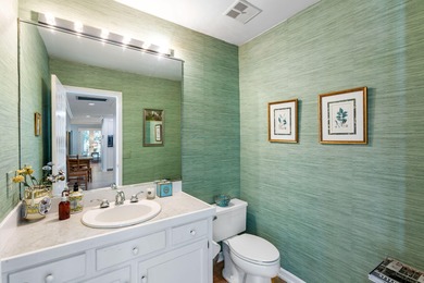 Classic and elegantly designed home with French provincial style on The Seabrook Island Club in South Carolina - for sale on GolfHomes.com, golf home, golf lot