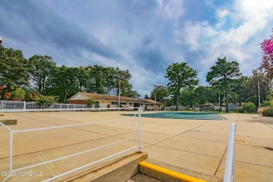 Welcome to this beautifully updated 2-bedroom, 1-bath attached on Greenbriar Woodlands in New Jersey - for sale on GolfHomes.com, golf home, golf lot