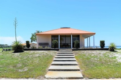 Half acre lot located in tranquil community of Indian Lake on Indian Lake Estates Golf and Country Club in Florida - for sale on GolfHomes.com, golf home, golf lot