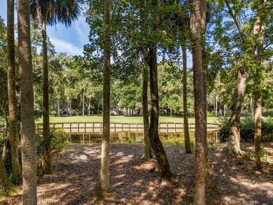 Classic and elegantly designed home with French provincial style on The Seabrook Island Club in South Carolina - for sale on GolfHomes.com, golf home, golf lot