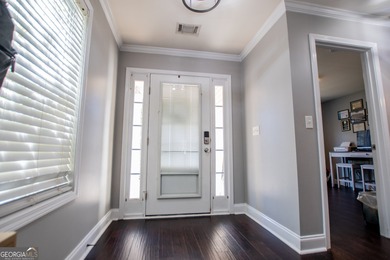 Looking for an open floor plan? This is it! Beautiful 4-bedroom on Fairfield Plantation Golf and Country Club in Georgia - for sale on GolfHomes.com, golf home, golf lot