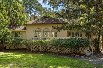Classic and elegantly designed home with French provincial style on The Seabrook Island Club in South Carolina - for sale on GolfHomes.com, golf home, golf lot