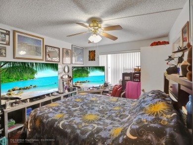 Welcome to this exquisite 2-bedroom/ 2-bathroom condo boasting on Sunrise Lakes Phase IV Golf Course in Florida - for sale on GolfHomes.com, golf home, golf lot