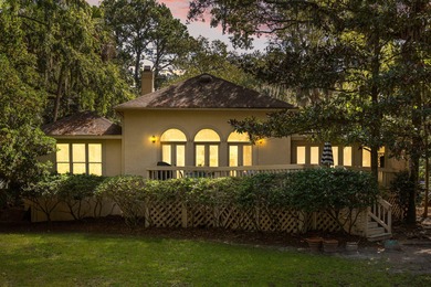 Classic and elegantly designed home with French provincial style on The Seabrook Island Club in South Carolina - for sale on GolfHomes.com, golf home, golf lot
