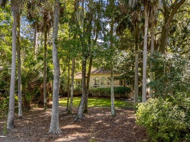 Classic and elegantly designed home with French provincial style on The Seabrook Island Club in South Carolina - for sale on GolfHomes.com, golf home, golf lot