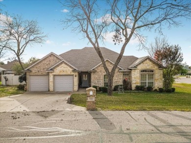 Nestled in a highly desirable gated community offering on Pecan Plantation Country Club in Texas - for sale on GolfHomes.com, golf home, golf lot