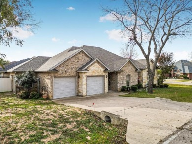 Nestled in a highly desirable gated community offering on Pecan Plantation Country Club in Texas - for sale on GolfHomes.com, golf home, golf lot