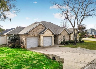 Nestled in a highly desirable gated community offering on Pecan Plantation Country Club in Texas - for sale on GolfHomes.com, golf home, golf lot