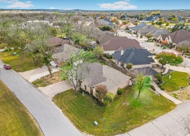 Nestled in a highly desirable gated community offering on Pecan Plantation Country Club in Texas - for sale on GolfHomes.com, golf home, golf lot