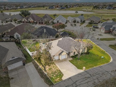 Nestled in a highly desirable gated community offering on Pecan Plantation Country Club in Texas - for sale on GolfHomes.com, golf home, golf lot