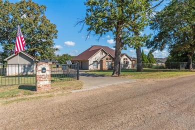 Waterfront home with approximately 150 feet of shoreline on Pinnacle Golf and Boat Club in Texas - for sale on GolfHomes.com, golf home, golf lot
