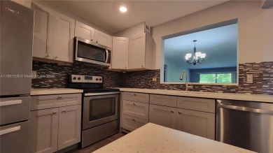 Beautifully remodeled condo in the sought-after Granada Village on Wynmoor Golf Course in Florida - for sale on GolfHomes.com, golf home, golf lot