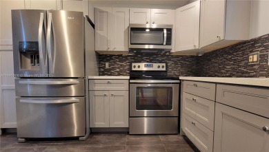 Beautifully remodeled condo in the sought-after Granada Village on Wynmoor Golf Course in Florida - for sale on GolfHomes.com, golf home, golf lot
