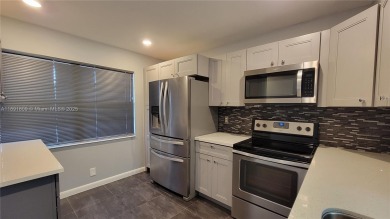 Beautifully remodeled condo in the sought-after Granada Village on Wynmoor Golf Course in Florida - for sale on GolfHomes.com, golf home, golf lot