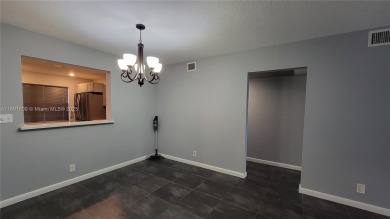 Beautifully remodeled condo in the sought-after Granada Village on Wynmoor Golf Course in Florida - for sale on GolfHomes.com, golf home, golf lot