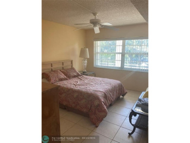 Opportunity knocks with this spacious F unit in Palm Aire on Oaks Country Club in Florida - for sale on GolfHomes.com, golf home, golf lot