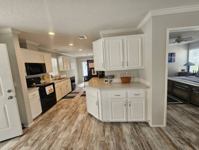 This stylish, like new, 2020 Jacobsen model has 3 bedrooms, 2 on Big Cypress Golf and Country Club in Florida - for sale on GolfHomes.com, golf home, golf lot