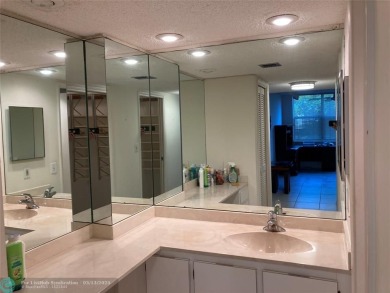 Opportunity knocks with this spacious F unit in Palm Aire on Oaks Country Club in Florida - for sale on GolfHomes.com, golf home, golf lot