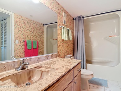 TRUE FLORIDA LIFESTYLE!!! Living in this building reflects what on Oceans Golf Club in Florida - for sale on GolfHomes.com, golf home, golf lot