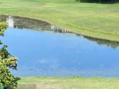 Opportunity knocks with this spacious F unit in Palm Aire on Oaks Country Club in Florida - for sale on GolfHomes.com, golf home, golf lot