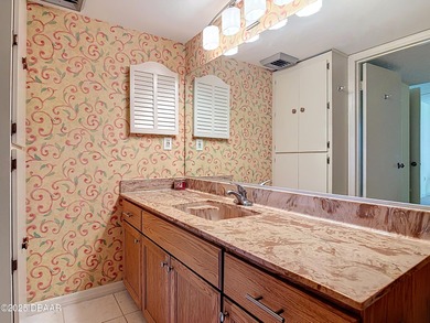 TRUE FLORIDA LIFESTYLE!!! Living in this building reflects what on Oceans Golf Club in Florida - for sale on GolfHomes.com, golf home, golf lot