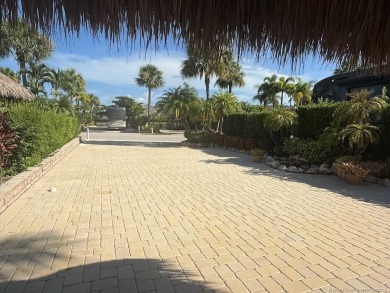 Stunning Waterfront Lot with Breathtaking Views - A MUST SEE! on Motorcoach Resort Golf Course in Florida - for sale on GolfHomes.com, golf home, golf lot